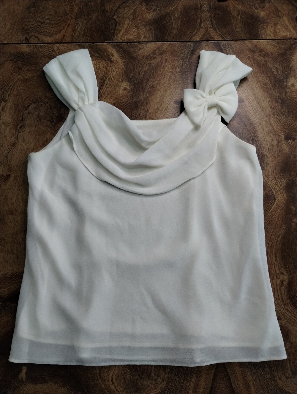 Elegant Ivory Sleeveless Knot-Shoulder Top